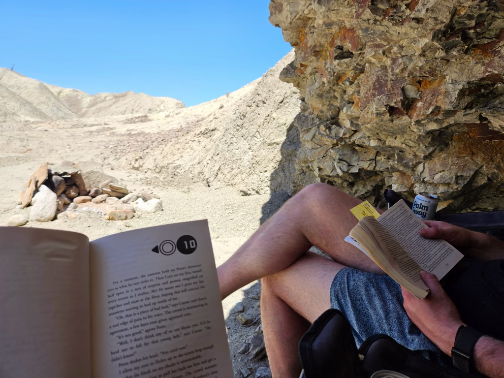 Relaxing and reading while dispersed camping in Anza-Borrego badlands
